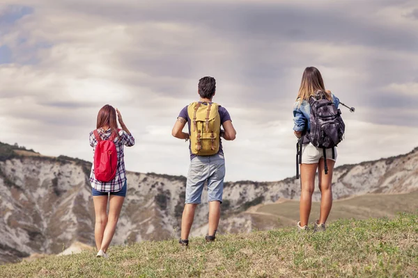 depositphotos_99635632-stock-photo-group-of-young-hikers-in
